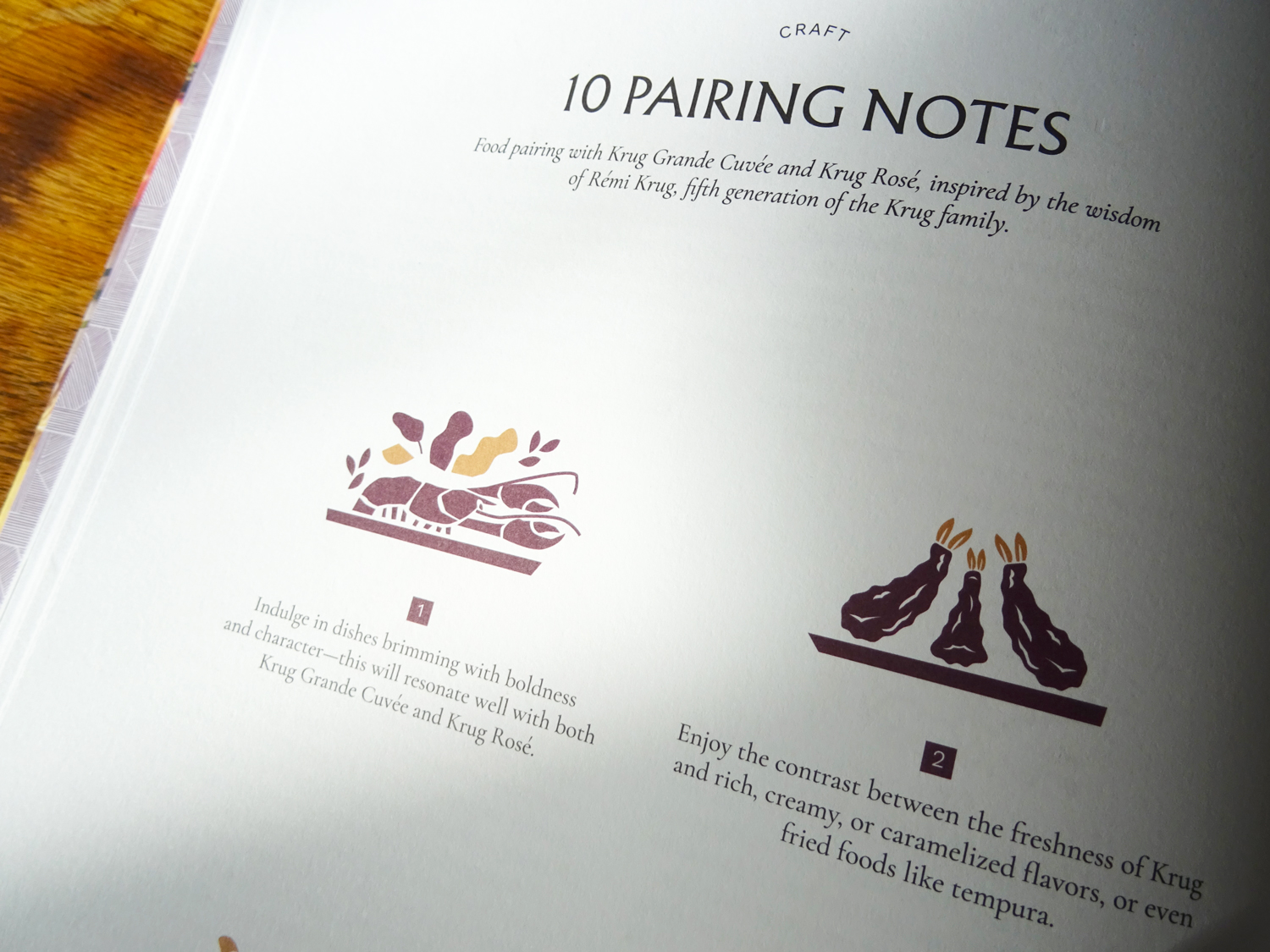 Close up on the book's page about 10 pairing notes with Champagne