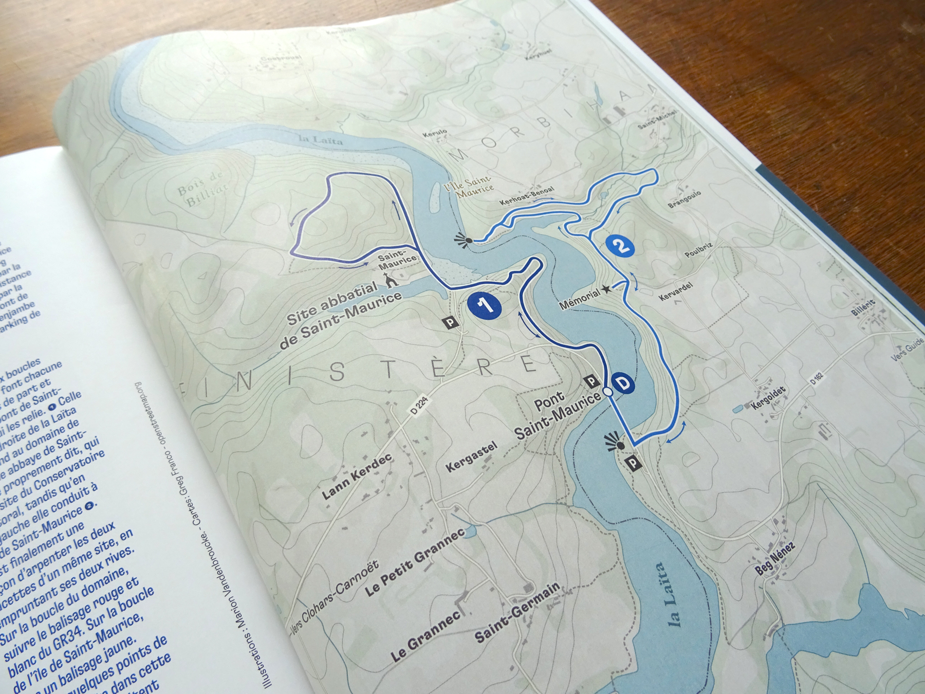 Close-up picture of the magazine open to the topographic map page redesigned after five years of an ongoing series.